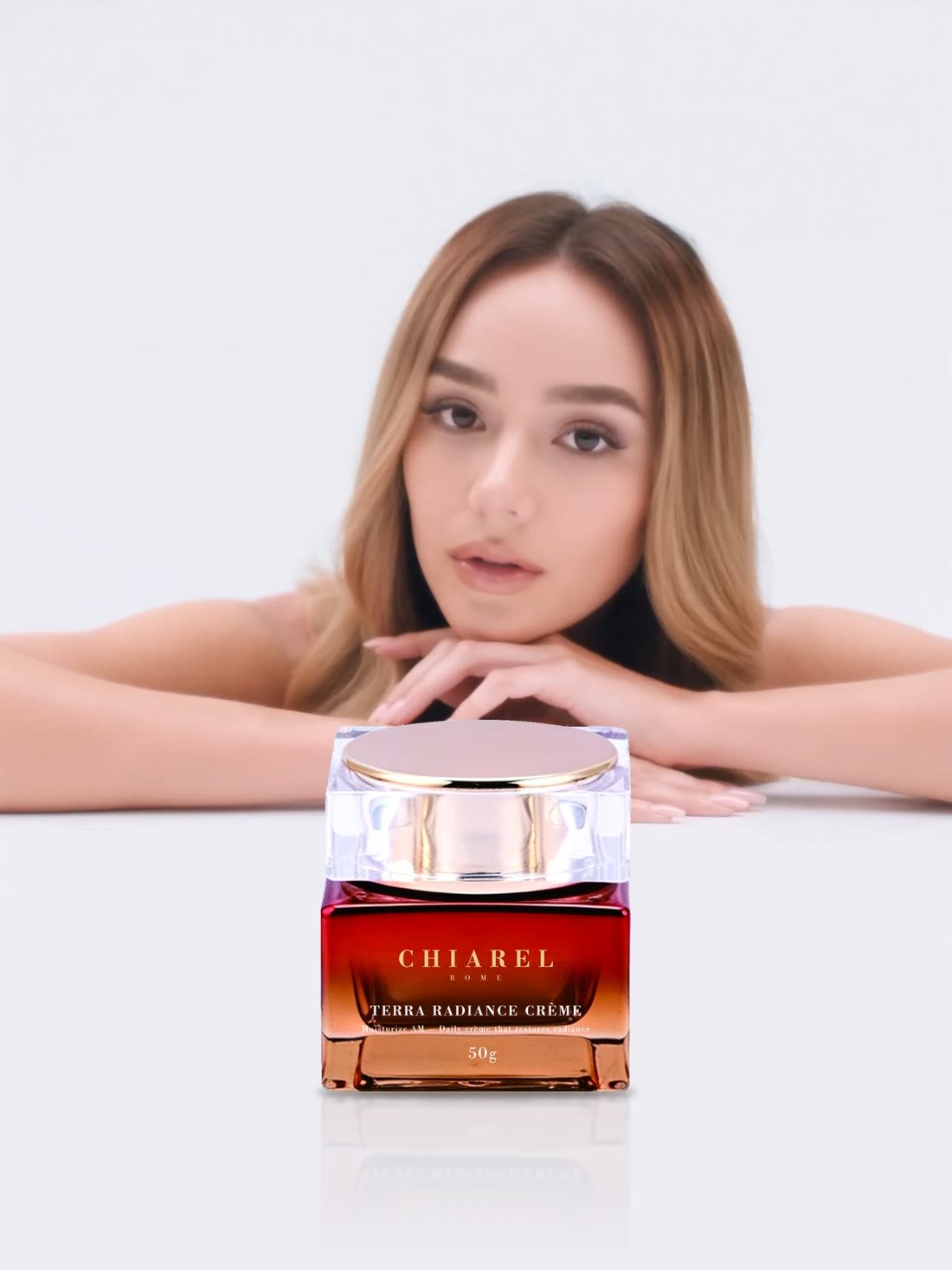 Terra Radiance Crème held in soft studio light